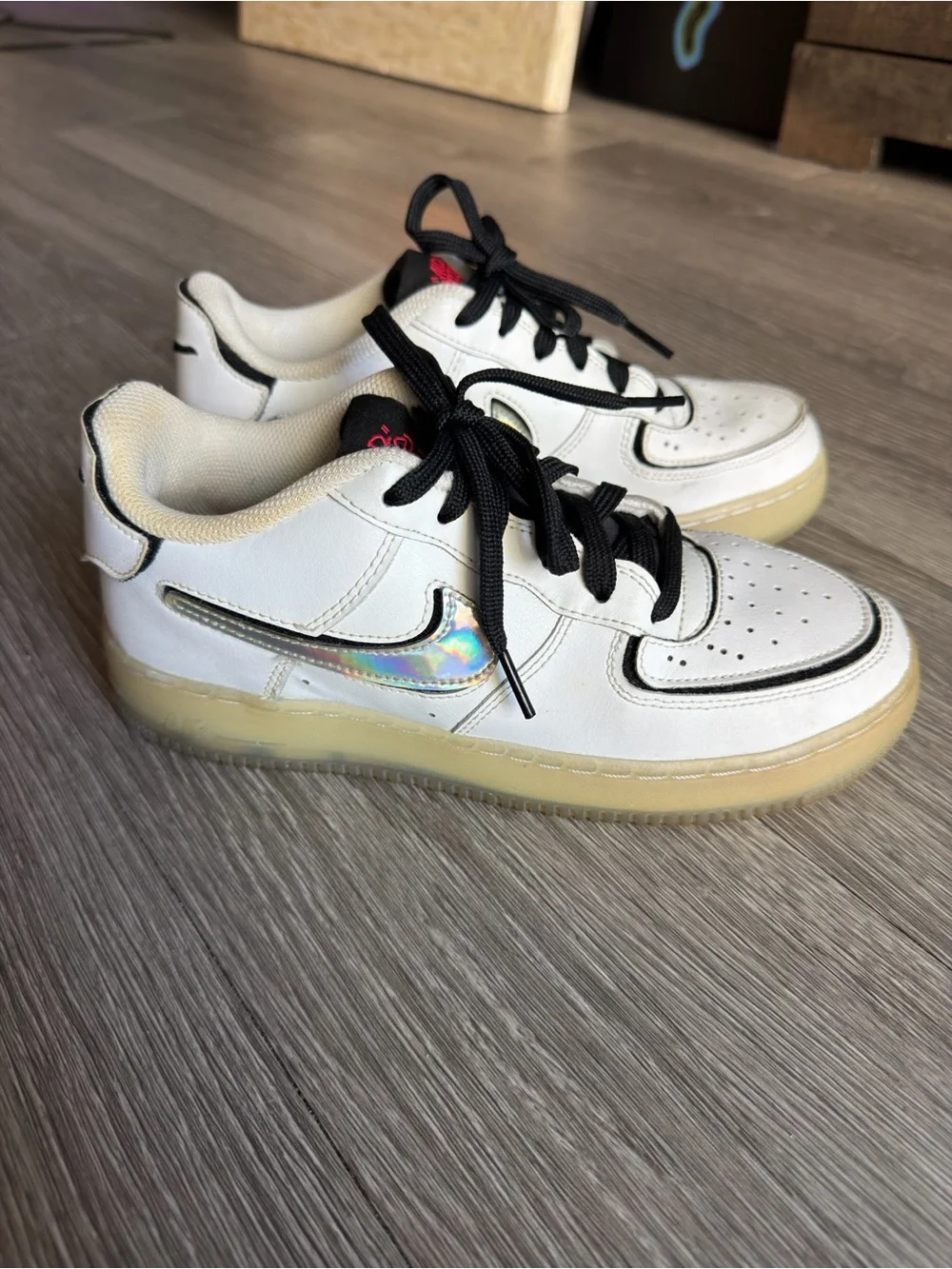 Nike Air Force One White Low-Top Sneakers with Black Accents Silver Logo